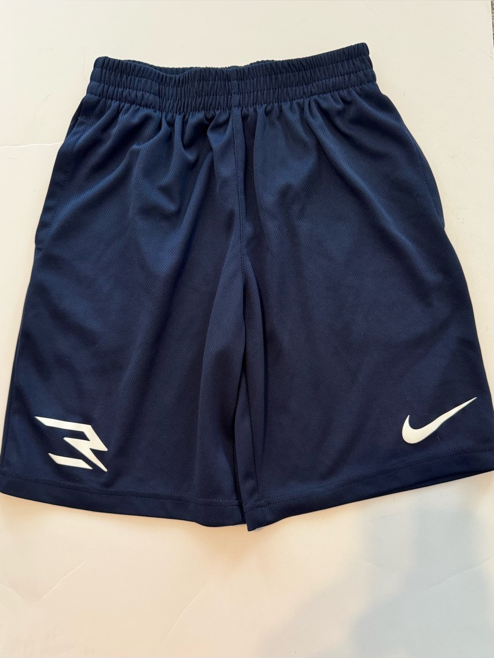 Nike Kids Navy Blue Athletic Shorts with White Swoosh